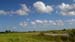 Blue_Sky_Green_Grass_Clouds_1920x1080